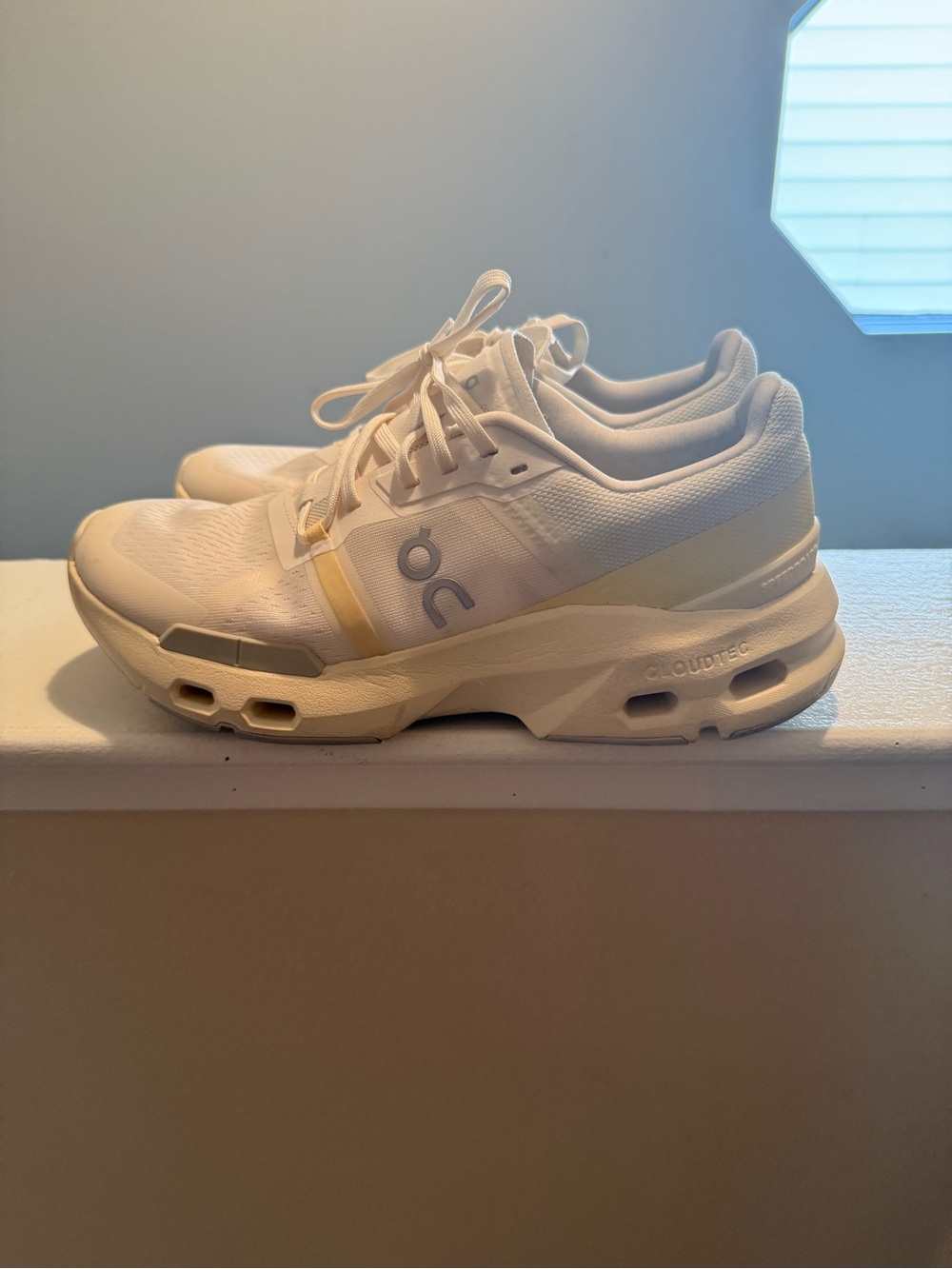 On Running Women's Sneakers in Off-White and Pale Yellow